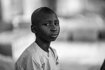 Black-and-white portrait of a child — Documentaries collection cover