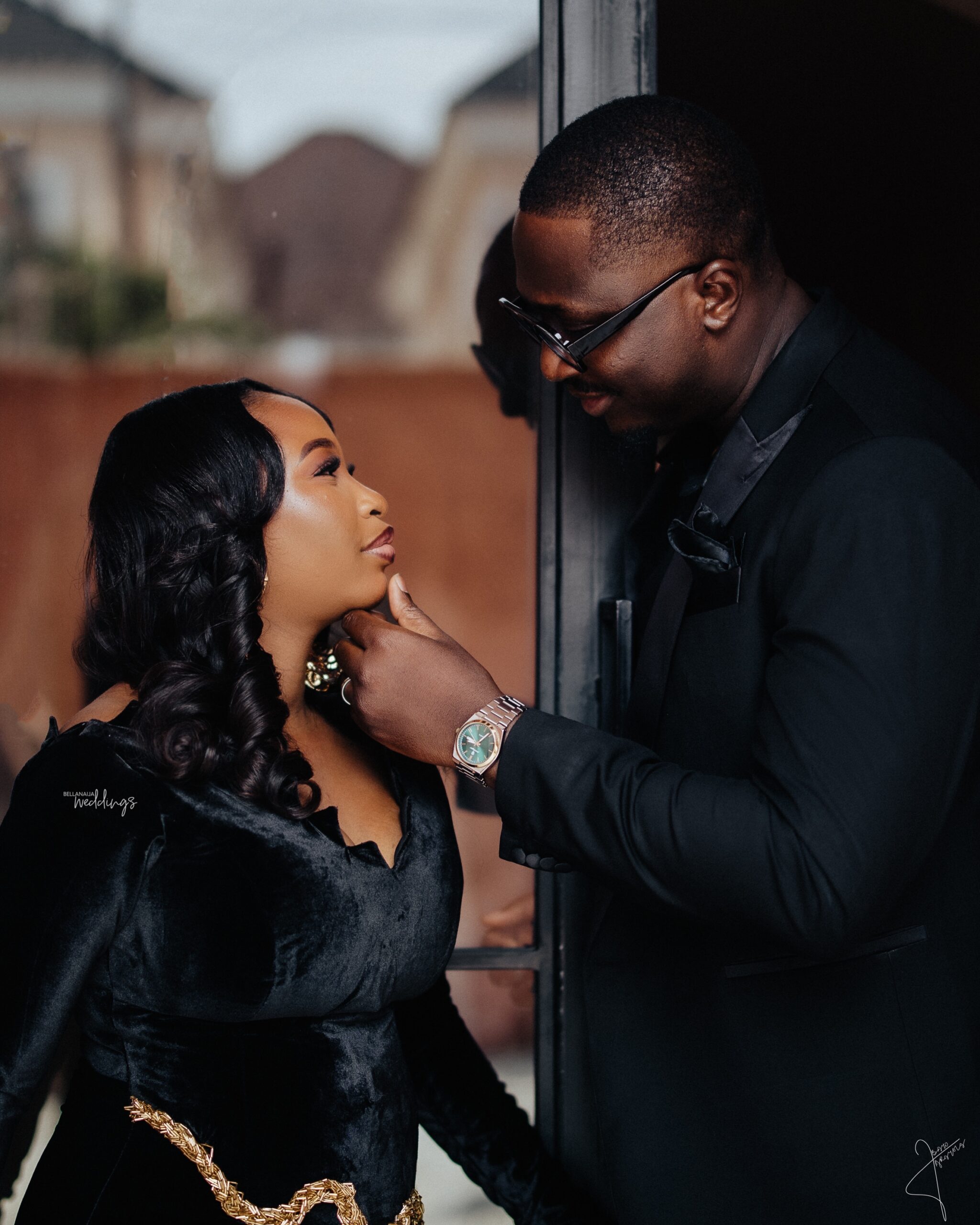 Tunmise and Haleem sharing an intimate moment in black evening outfits